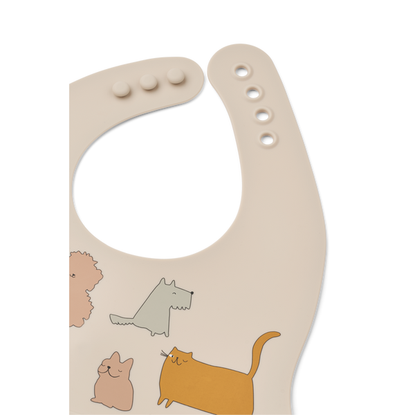 Ember silicone bib with playful cat and dog designs, perfect for mealtime messes.