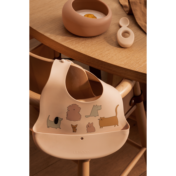 2-pack Ember silicone bib featuring cute animal prints, perfectly designed for mealtime messes.