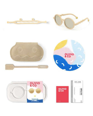 Toddler Sonnenbrille Desert Sand liegend auf hellem Untergrund