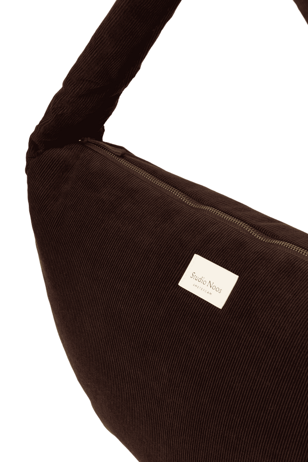 Studio Noos Rib Puffy Cross Body Bag geöffnet mit Innenfach