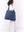 Weisse Herzen auf dem dunkelblauen Denim der Studio Noos Mom Bag