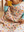 Little Casimir Boo Lätzchen im Print Confetti II mit krempelbaren Ärmeln