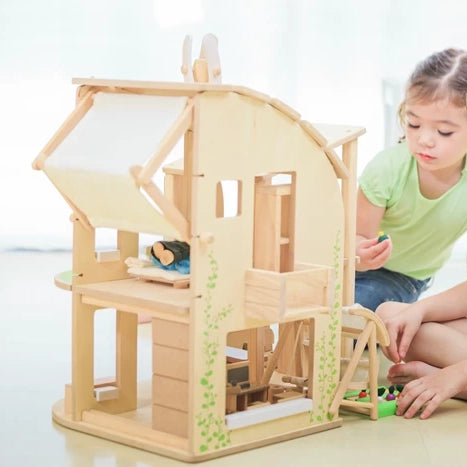 Maison de poupée éco-responsable avec mobilier