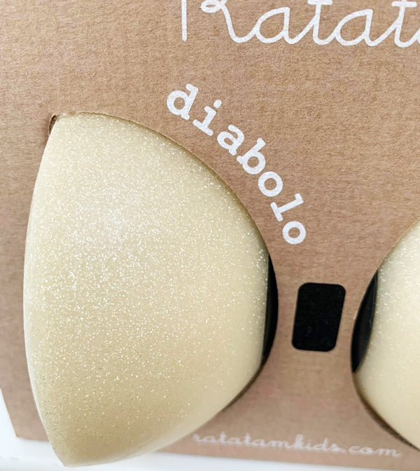 Beiger glitzernder Diabolo