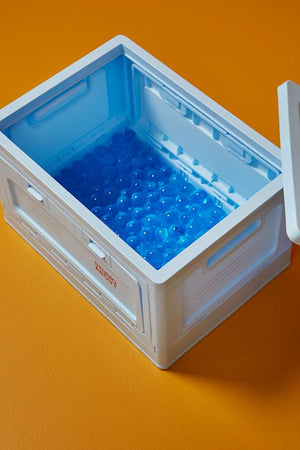 Studio About Aufbewahrungsbox Medium Hellblau mit Spielzeug
