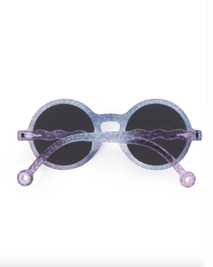 Kind von 3 bis 5 Jahren mit der Olivio&Co. Sonnenbrille Coral Fantasy