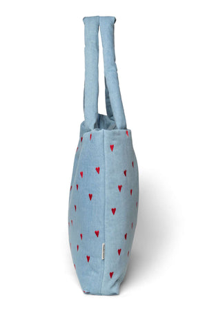 Mom Bag von Studio Noos am Kinderwagen eingehängt