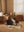 Apple Tufted Teppich, Constellation Pouf und Rivan Aufbewahrungskörbe von ferm LIVING