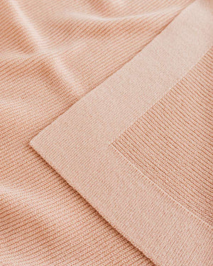 Hvid Babydecke Gust Apricot, Ecke im Detail