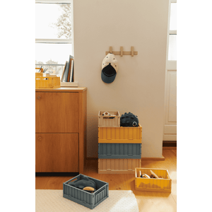 Liewood Weston Aufbewahrungsbox in Zitronengelb im Kinderzimmer