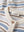 Strickstrampler Coconut Milk / Dusty Blue