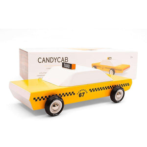 Gelbes Holztaxi CandyCab von Candylab, mit Farbe auf Wasserbasis lackiert