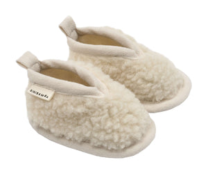 BINIBAMBA Booties Schaffell-Babyschuhe in Milk mit Ledersohle
