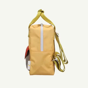 Sticky Lemon Envelope Rucksack apple juice von Kind getragen
