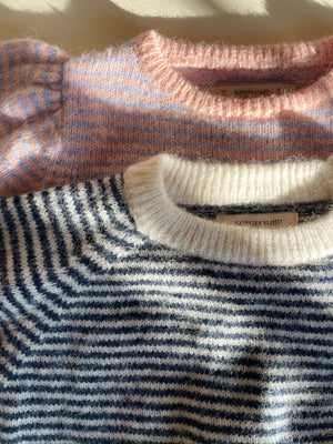 Berle Strickpullover von Konges Sløjd neben weiterer Farbvariante