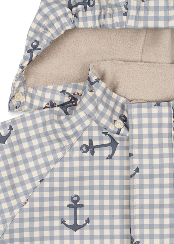 Palme Regenset Sailor Check, warm waterproof rain set with soft fleece lining and anchor pattern.