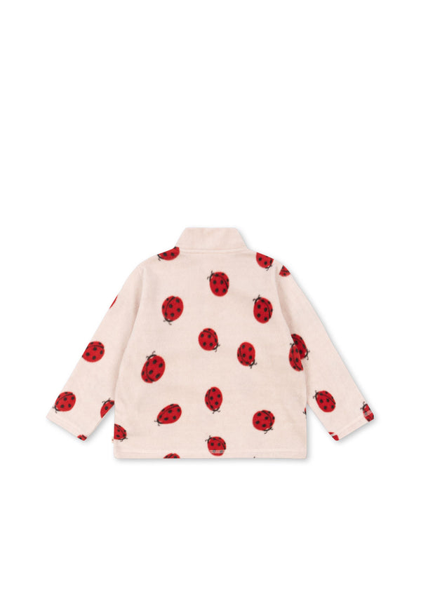 Back view of Tavi Fleece-Sweatshirt in soft fabric with ladybug print, perfect for warmth and style.