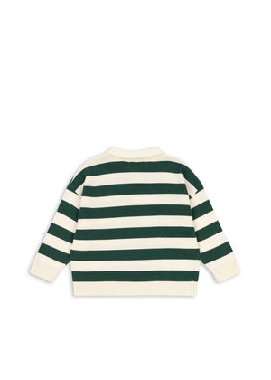Kind trägt das Manis Strick-Poloshirt aus Bio-Baumwolle
