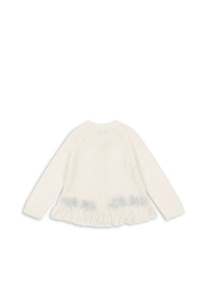 Detailansicht der handgestickten Beere am Minia Cardigan