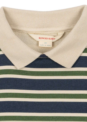 Kind trägt Konges Sløjd Spotty Polo Spellbound Stripe