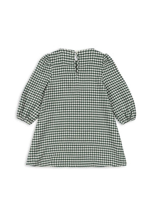 Kind trägt das Fort Kleid Green Check