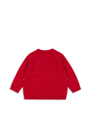Kind trägt das rote Basi Poloshirt von Konges Sløjd